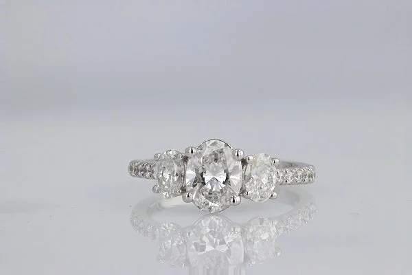 3-Stone 1 Ct F/SI1 Lab Grown Oval Diamond Engagement Ring