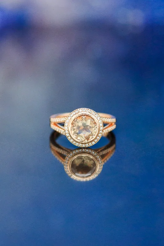 "DAWN" - ROUND CUT OREGON SUNSTONE ENGAGEMENT RING WITH DIAMOND ACCENTS