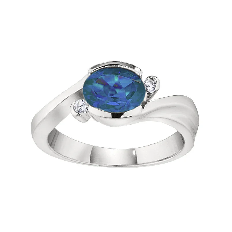 Modern Bypass Blue Topaz and Diamond Ring