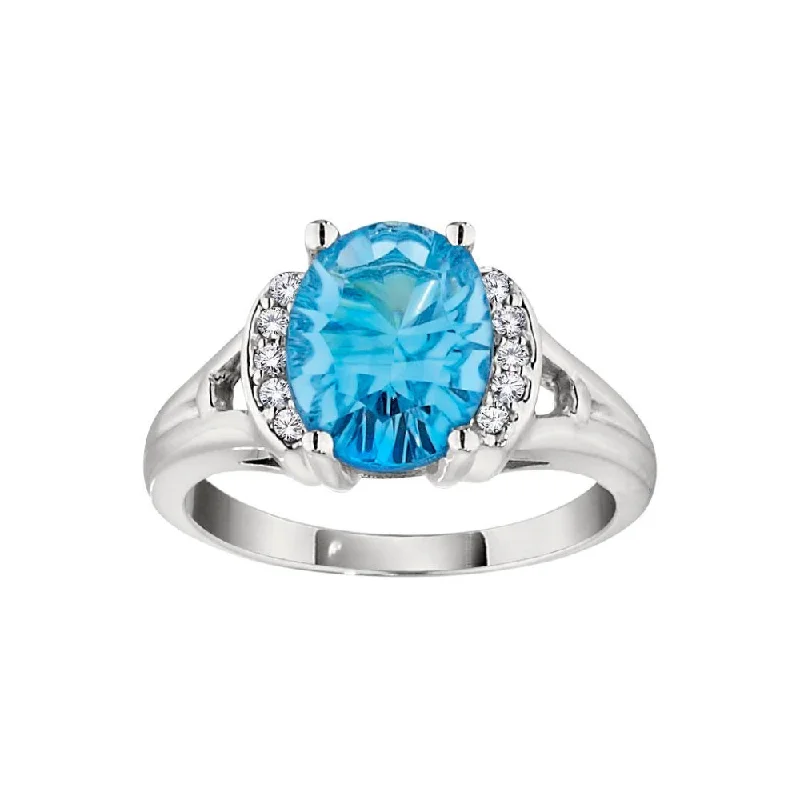 Modern Blue Topaz And Diamond Ring